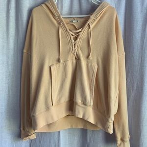 pale orange sweatshirt